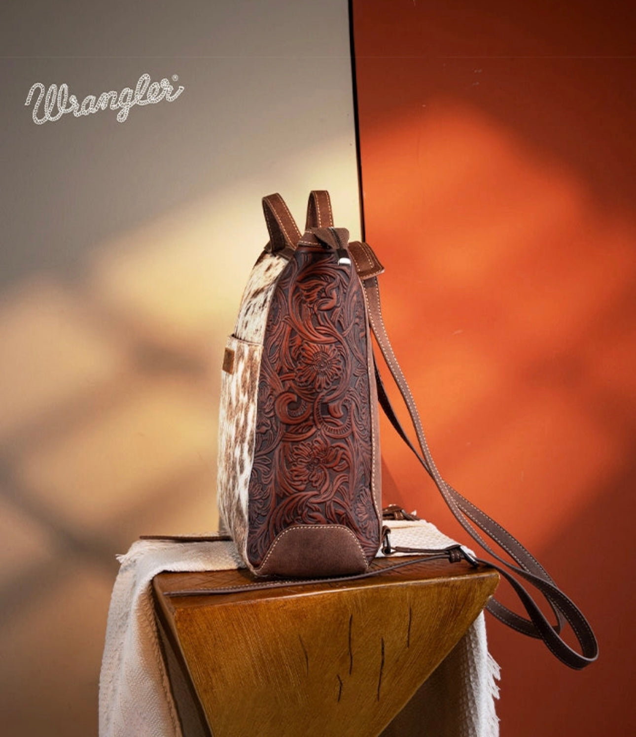 WRANGLER GENUINE HAIR-ON COWHIDE
CONVERTIBLE BACKPACK- BLACK HIDE/LEATHER