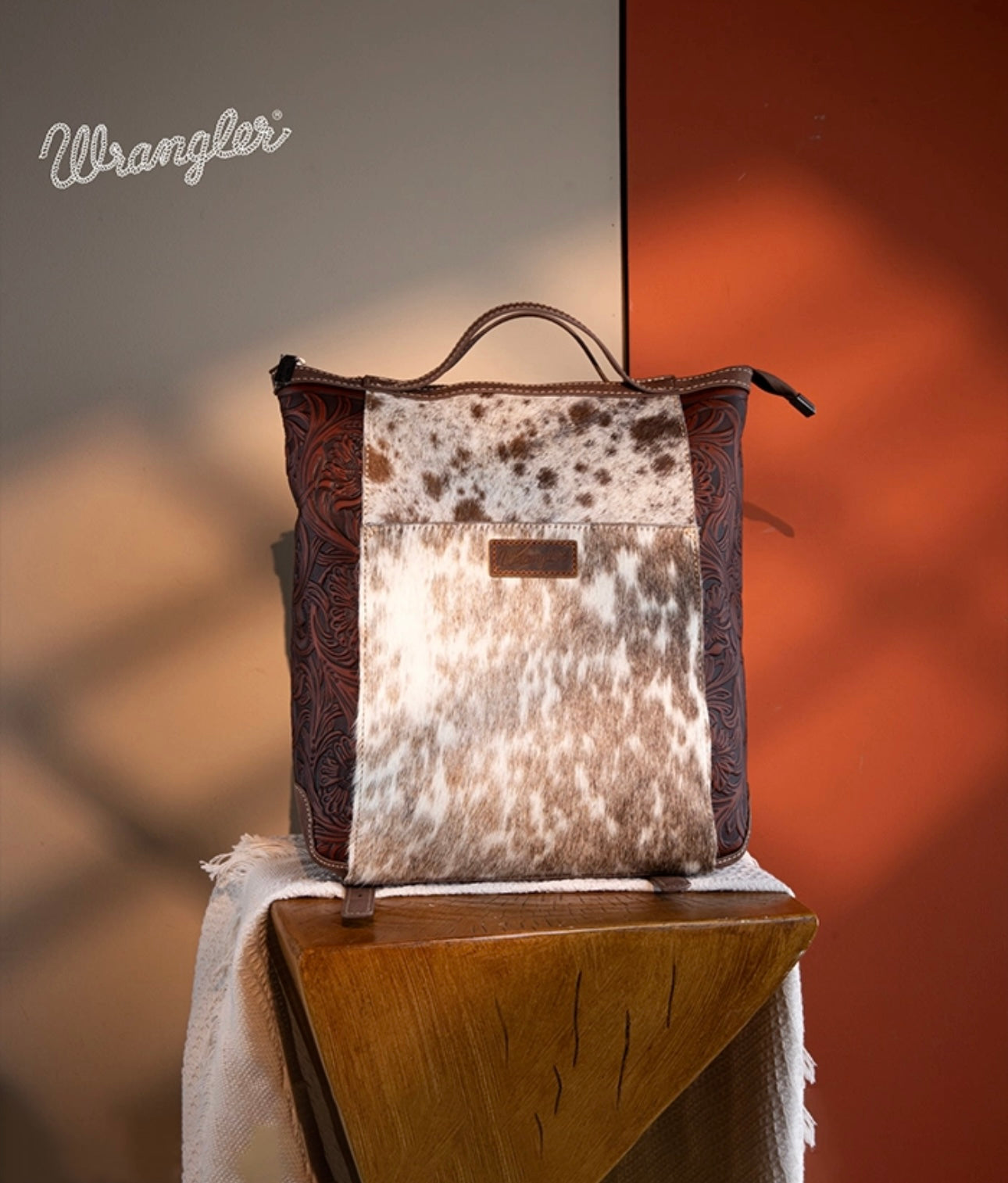 WRANGLER GENUINE HAIR-ON COWHIDE
CONVERTIBLE BACKPACK- BLACK HIDE/LEATHER
