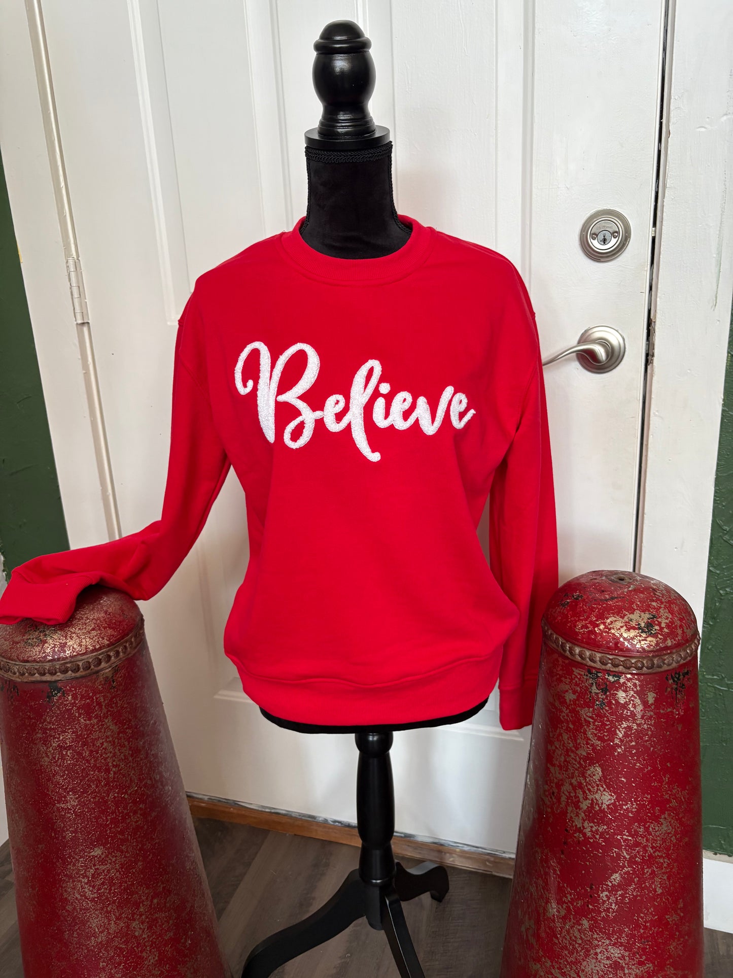 Believe sweater