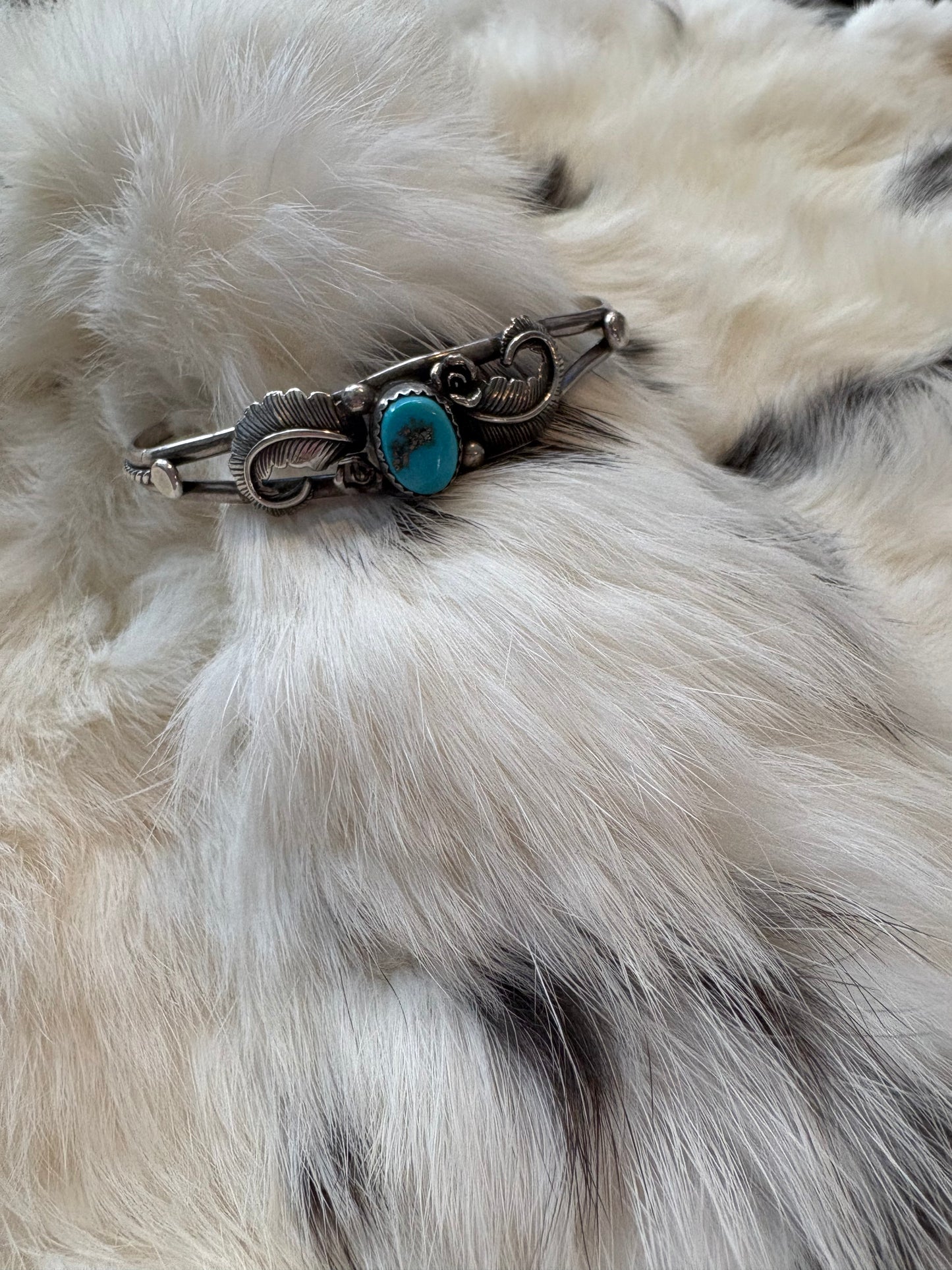 Natural turquoise feather