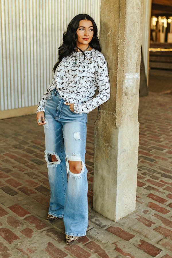 Light Wash High Rise Distressed Bootcut Jeans