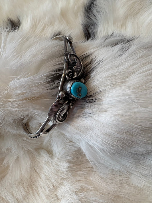 Natural turquoise feather